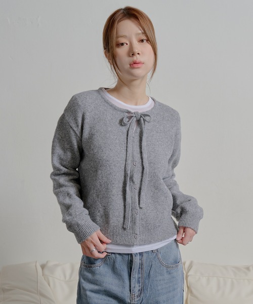 UNE MANSION（ユヌマンション）の「ラブリーフロントリボンボタンカーディガン（ニット/セーター・レディース・ベージュ/ブラック/アイボリー/グレー・FREE）」の6枚目の写真