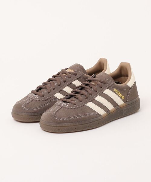 adidas(アディダス)の「ADIDAS アディダス HANDBALL SPEZIAL ハンドボール スペツィアル KK1153 EART/WOND/GUM5(スニーカー・メンズ・ブラウン・24.0cm/25.5cm/26.5cm/26.0cm/23.5cm/23.0cm/22.5cm/28.0cm/27.5cm/27.0cm/22.0cm/30.0cm/29.0cm/28.5cm/25.0cm/24.5cm)」の1枚目の写真