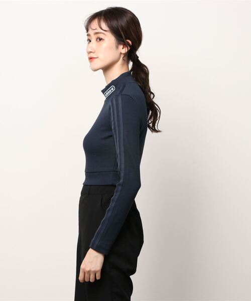 adidas（アディダス）の「クロップド長袖Tシャツ / アディダス