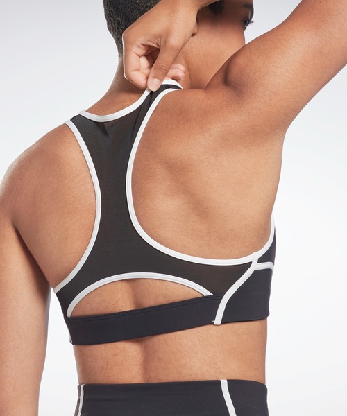 Reebok(リーボック)の「ラックス レーサー カラーブロック パデッドブラ / Lux Racer Colorblocked Padded Bra(スポーツブラ・レディース・パープル/ブラック/グリーン・LARGE/MEDIUM/SMALL/X-LARGE/X-SMALL)」の7枚目の写真