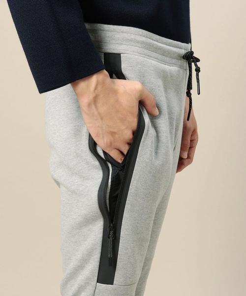 NIKE(ナイキ)の「<NIKE(ナイキ)> TECH SWT PT/パンツ◆(その他パンツ・メンズ・グレー・MEDIUM/SMALL/LARGE)」の2枚目の写真