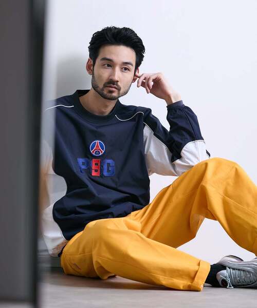 PARIS SAINT-GERMAIN（パリサンジェルマン）の「【Paris Saint-Germain / パリ・サン＝ジェルマン】JP Classic Piste（ナイロンジャケット・メンズ・ネイビー/ブラック・MEDIUM/LARGE）」の4枚目の写真