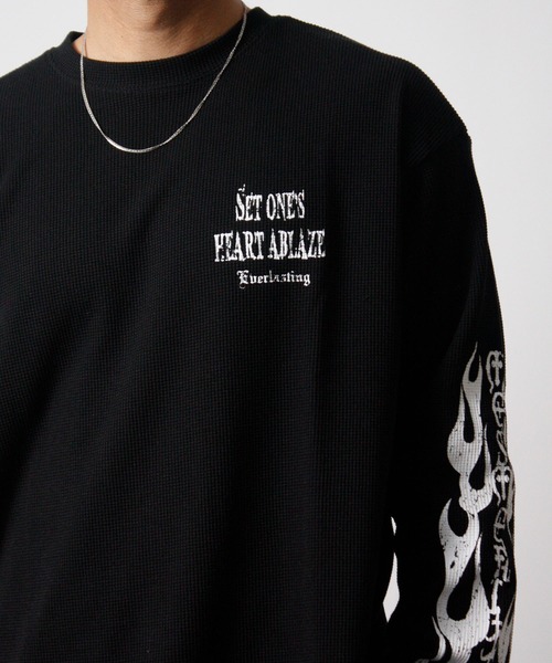 NYLAUS(ナイラス)の「【NYS】クロスロゴ ワッフルロングTシャツ ウイングロゴ トライバルデザイン ロンT 長袖Tシャツ(Tシャツ/カットソー・メンズ・ホワイト系その他/ホワイト/ブラック/ブラック系その他・M/L)」の9枚目の写真