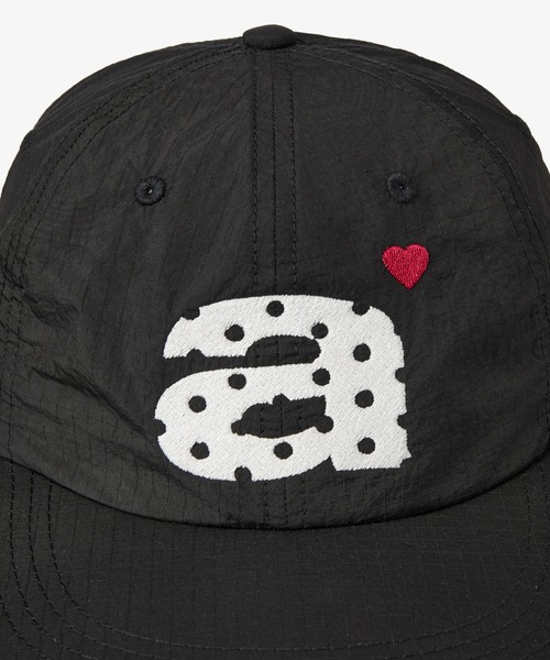 aeae（エーイーエーイー）の「DOT SMALL LETTER NYLON CAP