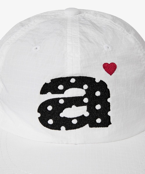 aeae（エーイーエーイー）の「DOT SMALL LETTER NYLON CAP