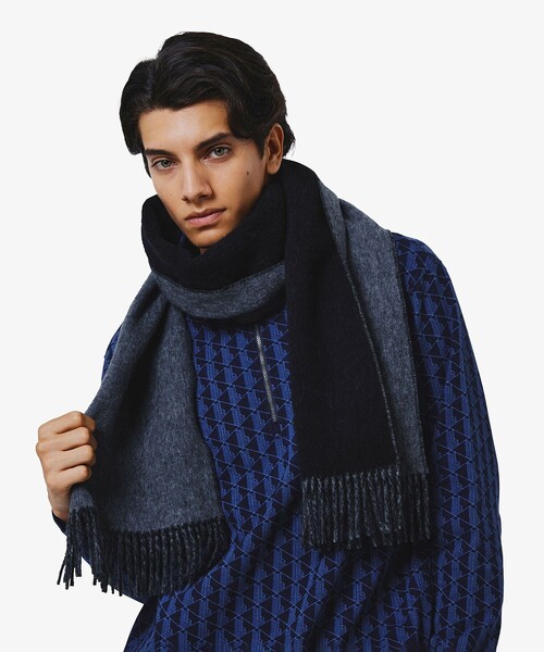 LACOSTE(ラコステ)の「リバーシブルメリノウールマフラー(マフラー・メンズ・グレー系その他/ブラック×ブラック・FREE)」の1枚目の写真