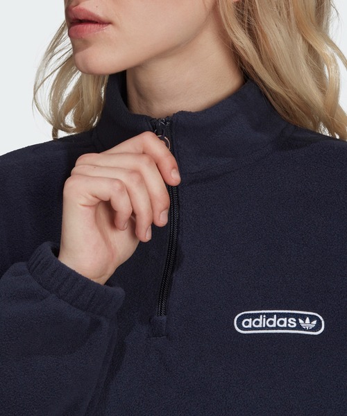 adidas ハーフジップ　クロップド丈スウェット adidas（アディダス）の「クォータージップ クロップド