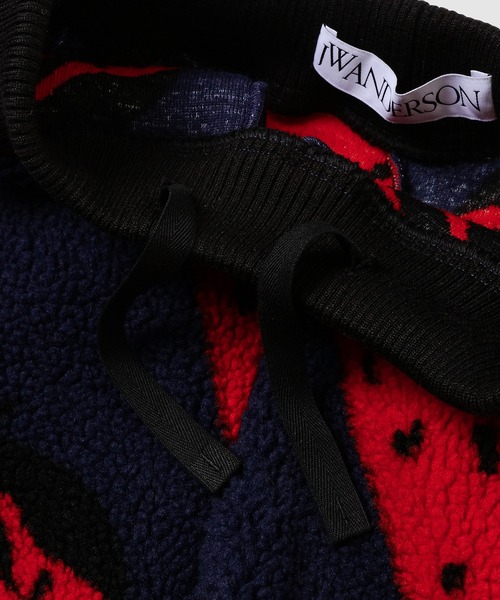JW Anderson（ジェイダブリューアンダーソン）の「TAPERED JOGGERS（その他パンツ・メンズ・ベージュ系その他/レッド系その他・SMALL/MEDIUM）」の4枚目の写真