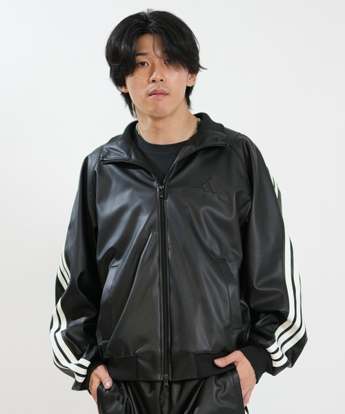 adidas(アディダス)の「adidas/アディダス ジャージ トラックジャケット レザー風 スタジアム ルーズフィット フェイクレザー トラックジャケット セットアップ対応 HL312(ジャージ・メンズ・ブラック×ホワイト/ブラック×ブラック・XL/L/M)」の1枚目の写真