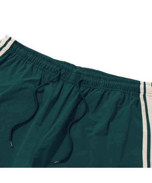 F.ILLUMINATE(フィルミネイト)の「ナイロンツーピンタックテーピングパンツ-ブルーグリーン(スウェットパンツ・レディース・その他・SMALL/MEDIUM/LARGE/X-SMALL)」の7枚目の写真