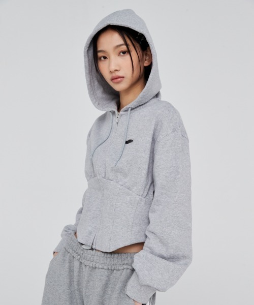 Opening Project(オープニングプロジェクト)の「W Corset Hood Zip-up / コルセットデザイン ワンポイント刺繍 ジップアップフーディー(パーカー・レディース・グレー/カーキ・S/M)」の1枚目の写真
