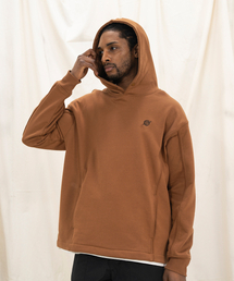 KALAPATTHAR（カラパタール）の「KP SYMBOL LOGO INCISION HOODIE - BROWN（パーカー）」