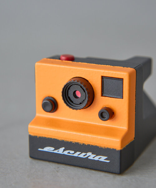 BIRTHDAY BAR(バースデイバー)の「レトロ-1 超小型デジタルカメラ(生活家電・レディース・ホワイト/オレンジ・0)」の4枚目の写真