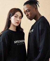APOSTROPHE COMMA（アポストロフィコンマ）の「MELTED LOGO SWEAT SHIRTS (Black/Ivory)（スウェット）」