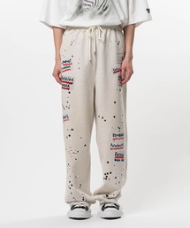 MIHARAYASUHIRO（ミハラヤスヒロ）の「【MIHARAYASUHIRO/ミハラヤスヒロ】EMBELLISHED STICKER PANTS（スウェットパンツ）」