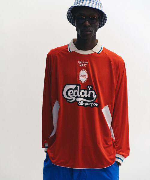 SEDAN ALL-PURPOSE（セダンオールパーパス）の「SEDAN ALL-PURPOSE | Reebok 長袖ゲームシャツ MEN（Tシャツ/カットソー・メンズ・レッド/オフホワイト・M/XL/L）」の4枚目の写真