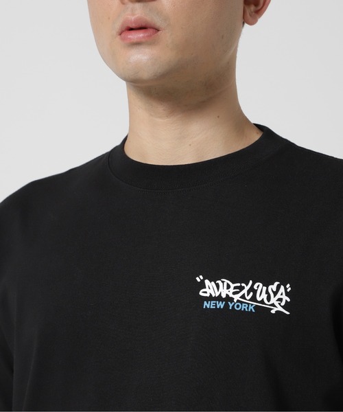 AVIREX（アヴィレックス）の「《直営店限定》GRAFFITI T-SHIRT "BORN IN THE NYC" / グラフィティ Tシャツ "ボーン イン ザ ニューヨーク" / AVIREX / アヴィレックス（Tシャツ/カットソー・メンズ・オリーブ系/ネイビー/ホワイト/ブラック・M/L/2XL/XL）」の20枚目の写真