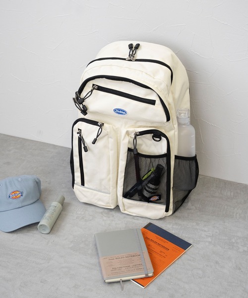 Dickies(ディッキーズ)の「【Dickies】CIRCLE LOGO PATCH BACKPACK / ディッキーズ サークルロゴ刺繍 パッチ バックパック(バックパック/リュック・メンズ・レッド/オフホワイト/ブルー/ブラック・FREE)」の1枚目の写真