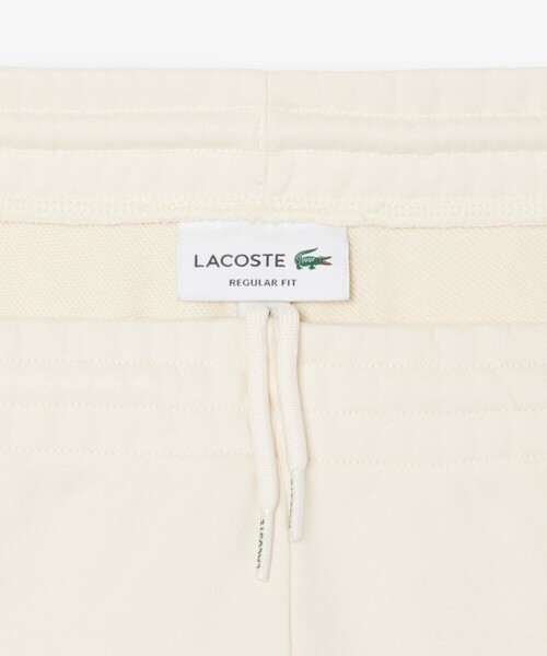 LACOSTE（ラコステ）の「ヘリテージテニスロゴスウェットトラックパンツ（スウェットパンツ・メンズ・オフホワイト・2/4/3/5）」の6枚目の写真