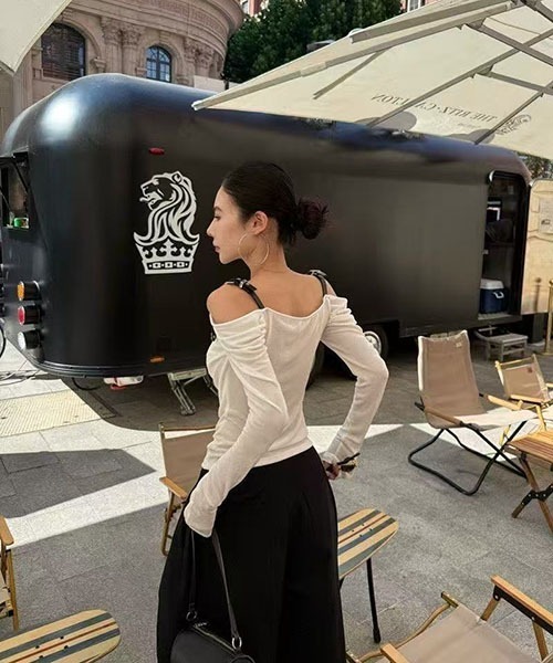 gossip!ロサンゼルス(ゴシップロサンゼルス)の「ベルトストラップ ドレープトップス(Tシャツ/カットソー・レディース・ホワイト・S/M)」の2枚目の写真