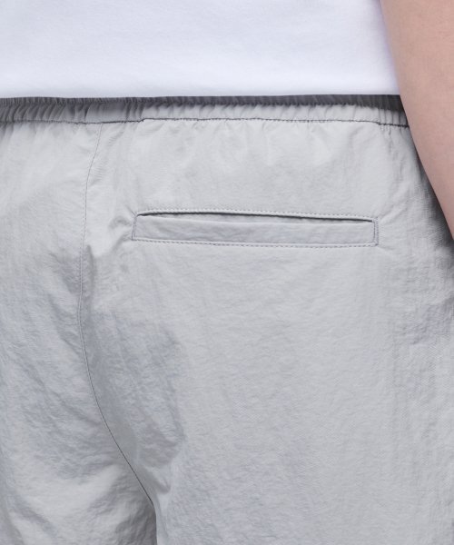 MUSINSA STANDARD（ムシンサスタンダード）の「ナイロンドローストリングトラックショーツ [アッシュグレー]（その他パンツ・メンズ・その他・26）」の6枚目の写真