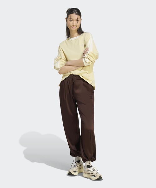 adidas（アディダス）の「ラックスフロー サテン ルーズフィット ストレートレッグ オープンヘム パンツ / アディダス adidas（スウェットパンツ・レディース・ブラウン・LARGE/XX-LARGE/X-SMALL/X-LARGE/SMALL/MEDIUM）」の6枚目の写真