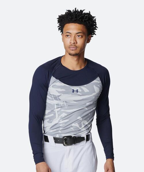 UNDER ARMOUR(アンダーアーマー)の「UAヒートギア コンフォート フィッティド ノベルティ ロングスリーブ クルーネック シャツ(ベースボール/メンズ)(Tシャツ/カットソー・メンズ・ネイビー・L/S/M/2XL/XL/3XL)」の1枚目の写真