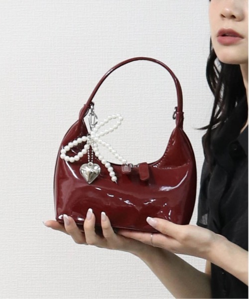THE CELL.(ザセルドット)の「チャーム付き MINIハンドバッグ MINI HANDBAG WITH CHARM(ハンドバッグ・レディース・ピンク/オフホワイト/ワイン/シルバー/ブラック・FREE)」の1枚目の写真