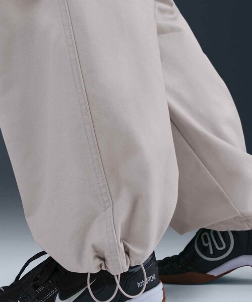 NIKE(ナイキ)の「ナイキ スポーツウェア ウィメンズ ミッドライズ オーバーサイズド ウーブン カーゴ パンツ / Nike Sportswear Women's Mid-Rise Oversized Woven Cargo Pants HV1967-667 Silt Red(カーゴパンツ・レディース・ピンク系その他2・S/XL/L/XS/M)」の9枚目の写真