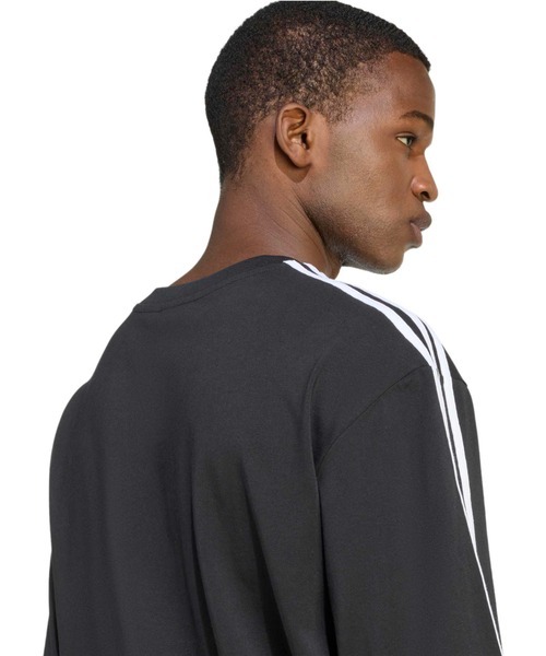 adidas(アディダス)の「adidas ADICOLOR 3-STRIPES OVERSIZED TEE / アディダス アディカラー 3 ストライプ オーバーサイズ ティー(Tシャツ/カットソー・メンズ・ブラック・XXL/XL/L/M/S)」の7枚目の写真