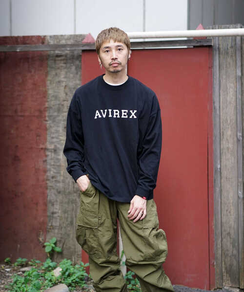 AVIREX（アヴィレックス）の「【直営店限定】カレッジ ロゴ 長袖 Tシャツ/COLLEGE LOGO LS T-SHIRT/アヴィレックス/AVIREX（Tシャツ/カットソー・メンズ・ホワイト/ブラック・MEDIUM/LARGE/X-LARGE/XX-LARGE）」の13枚目の写真