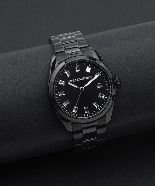 KARL LAGERFELD(カールラガーフェルド)の「「KARL LAGERFELD/カール・ラガーフェルド」ラウンド エッセンシャル - ブラック サンレイ クリスタルストーン ダイヤル ブラック ブレスレット(アナログ腕時計・レディース・ブラック・FREE)」の1枚目の写真