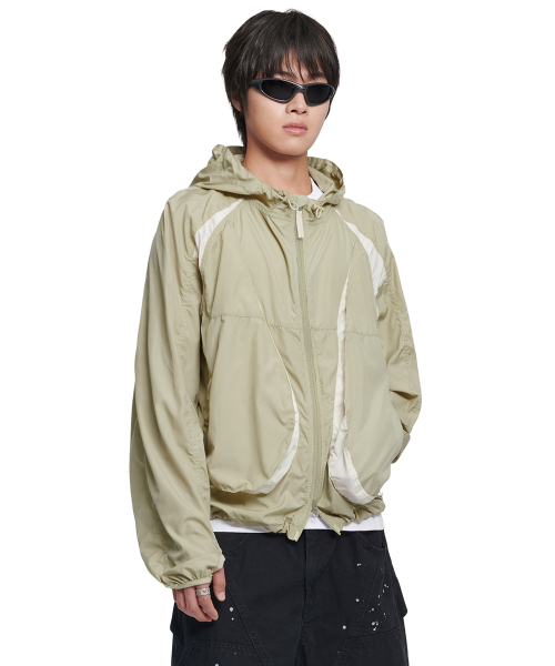 NOMANUAL(NOMANUAL)の「LIGHT SLASH JACKET - BEIGE(ナイロンジャケット・レディース・その他・SMALL/MEDIUM/LARGE/X-LARGE)」の1枚目の写真