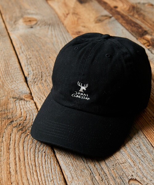 Jonas Claesson(ジョナスクレアッソン)の「JONAS CLAESSON/ジョナスクレアッソン SHIKA LOGO CAP/鹿ロゴ キャップ(キャップ・メンズ・ベージュ/その他9/ブラック・フリ-)」の1枚目の写真