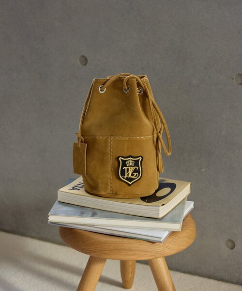 marco masi(マルコマージ)の「【MARCO MASI】スエードワッペン巾着(ショルダーバッグ・レディース・キャメル・FREE)」の1枚目の写真