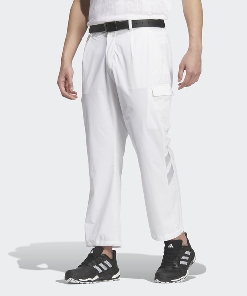 adidas(アディダス)の「ビヨンド ザ コース EX-Stretch active 撥水ルーズフィット アンクルカーゴパンツ【adidas Golf/アディダスゴルフ】(カーゴパンツ・メンズ・ホワイト・85/82/79/76/73/100/88/96/92)」の1枚目の写真
