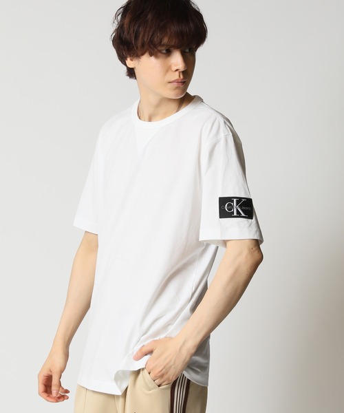 カルバン・クライン ジーンズ バッジ Tシャツ ブルー Calvin Klein（カルバン・クライン）の「Calvin Klein Jeans