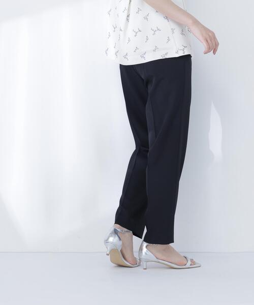 NATURAL BEAUTY BASIC(ナチュラルビューティーベーシック)の「撥水テーパードパンツ(その他パンツ・レディース・オフホワイト/ブラック・MEDIUM/SMALL)」の6枚目の写真