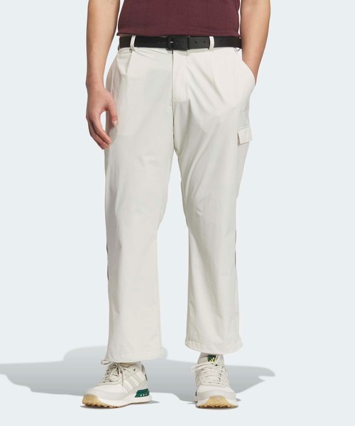 adidas(アディダス)の「ビヨンド ザ コース EX-Stretch active 撥水ルーズフィット アンクルカーゴパンツ【adidas Golf/アディダスゴルフ】(カーゴパンツ・メンズ・クリーム・100/88/92/96/73/76/79/82/85)」の1枚目の写真