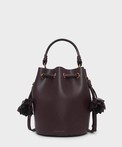 CHARLES & KEITH(チャールズ & キース)の「フローラルタッセルドローストリングバックルバッグ / FLORAL TASSEL DRAWSTRING BUCKET BAG(ハンドバッグ・レディース・ブラック/ブラウン/オレンジ・L)」の3枚目の写真