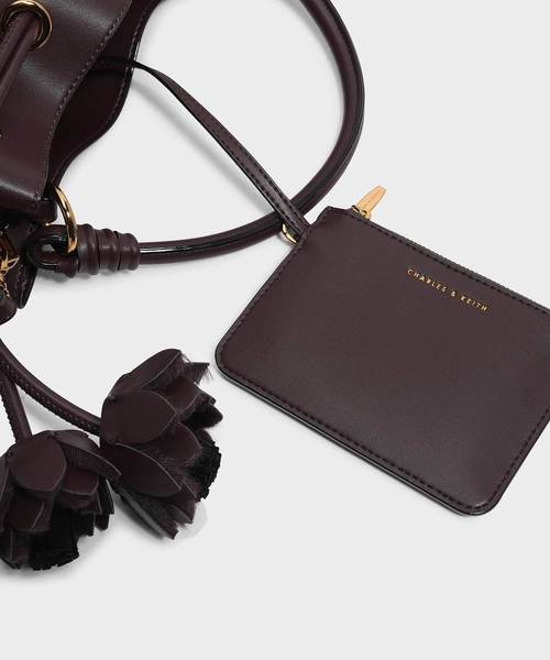 CHARLES & KEITH(チャールズ & キース)の「フローラルタッセルドローストリングバックルバッグ / FLORAL TASSEL DRAWSTRING BUCKET BAG(ハンドバッグ・レディース・ブラック/ブラウン/オレンジ・L)」の11枚目の写真