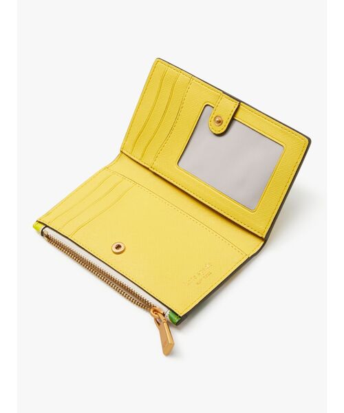 kate spade new york（ケイトスペード ニューヨーク）の「モーガン レモン トス エンボス スモール スリム バイフォールド