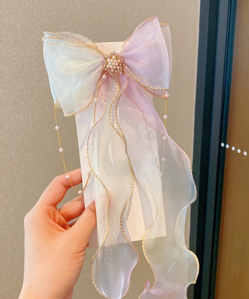 CALIFORNIA OUTFITTERS（カリフォルニア アウトフィッターズ）の「7B26 プリンセス オーロラカラー パールビジューリボンヘアクリップ（バレッタ/ヘアクリップ・キッズ・パープル/イエロー/ピンク/ブルー/ホワイト・ONESIZE）」の2枚目の写真