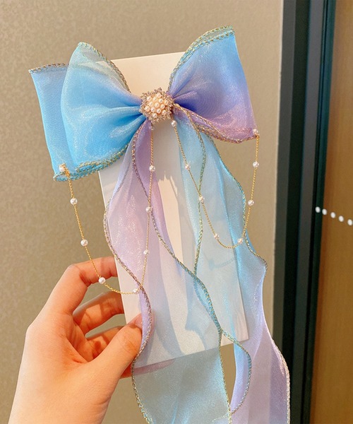 CALIFORNIA OUTFITTERS（カリフォルニア アウトフィッターズ）の「7B26 プリンセス オーロラカラー パールビジューリボンヘアクリップ（バレッタ/ヘアクリップ・キッズ・パープル/イエロー/ピンク/ブルー/ホワイト・ONESIZE）」の3枚目の写真