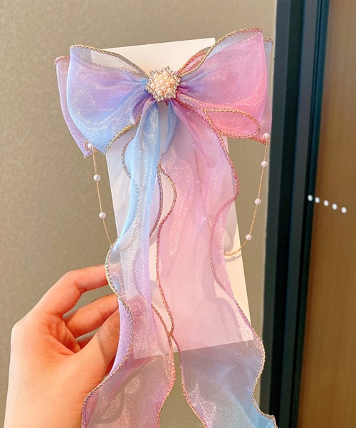 CALIFORNIA OUTFITTERS（カリフォルニア アウトフィッターズ）の「7B26 プリンセス オーロラカラー パールビジューリボンヘアクリップ（バレッタ/ヘアクリップ・キッズ・パープル/イエロー/ピンク/ブルー/ホワイト・ONESIZE）」の7枚目の写真