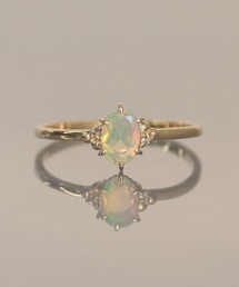 NOIR DE POUPEE（ノワールドプーペ）の「le bois　K10 オパール ホワイトサファイア　リング（リング・レディース）」