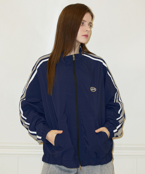 FEIHEI(フェイヘイ)の「THREE LINE NYLON JACKET NAVY(ナイロンジャケット・レディース・ネイビー・SMALL/LARGE/MEDIUM)」の1枚目の写真