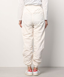 adidas（アディダス）の「アディカラー ナイロントラックパンツ