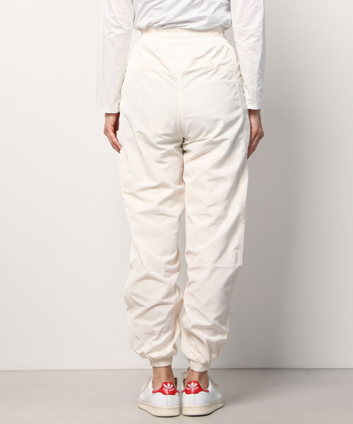 adidas（アディダス）の「アディカラー ナイロントラックパンツ