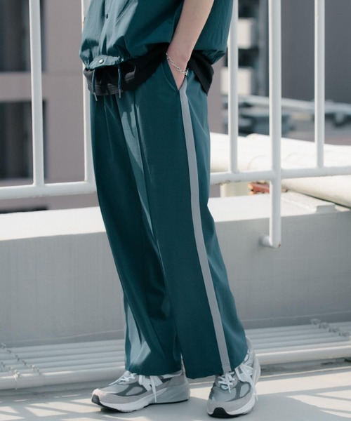 Uiscel(ユイセル)の「Uiscel 4wayストレッチサイドラインパンツ(その他パンツ・メンズ・ブラック/ブルー・MEDIUM/LARGE)」の10枚目の写真